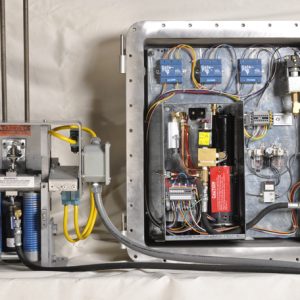 Modify H-W Rope Gripper Class 1 & 2, Division 1 & 2 per Drawing D-1413.7: Does NOT include Rope Gripper.: Plant air must be provided to the pumping unit enclosure.: 75-100 psi plant air is required to pumping unit enclosure.: Continuous air pressure, (very low volume needed), is required. : Reserve air tank is included.   : Harris Companies, Inc. has designed and modified Hollister-Whitney’s NEMA design rope grippers to meet hazardous location and National Electric Code Standards. The pumping unit is mounted in an enclosure to meet the electrical classification. Intrinsically safe relays and air pressure are used to make the rope gripper meet the criteria. These modified rope grippers are not UL certified.